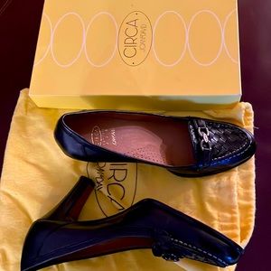 Brand new comfortable heeled black leather shoes